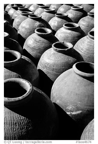 Jars in Ban Xang Hai, which used to be a pottery village. Laos (black and white)