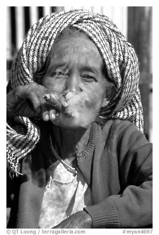 Woman smoking a cheerot,  Kalaw. Shan state, Myanmar (black and white)