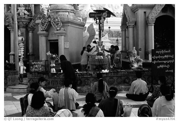 Water offering at Planetery post, Shwedagon Paya. Yangon, Myanmar (black and white)