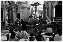 Water offering at Planetery post, Shwedagon Paya. Yangon, Myanmar (black and white)