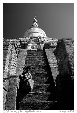 On steps of Shwesandaw Paya's upper terraces. Bagan, Myanmar