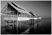 Huts on stilts in middle of lake. Inle Lake, Myanmar (black and white)