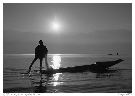 Intha fisherman, sunrise. Inle Lake, Myanmar (black and white)