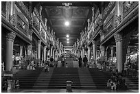 Eastern stairway bordered by souvenir stalls, Shwedagon Pagoda. Yangon, Myanmar ( black and white)