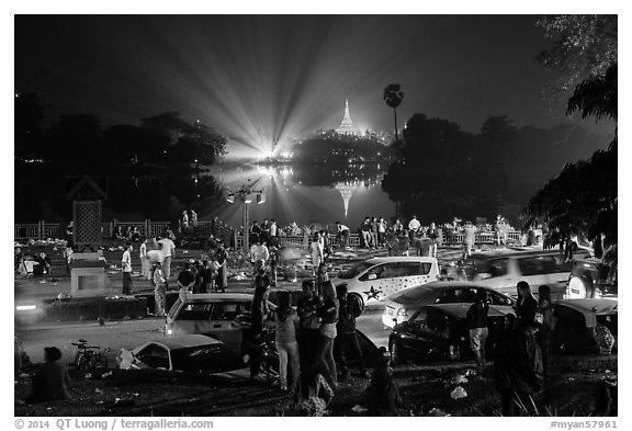 Shores of Kandawgyi with revelers on 2014 New Year night. Yangon, Myanmar (black and white)