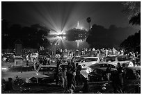 Shores of Kandawgyi with revelers on 2014 New Year night. Yangon, Myanmar ( black and white)