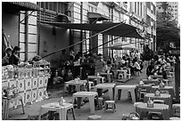 Outdoor eatery sitting on street. Yangon, Myanmar ( black and white)