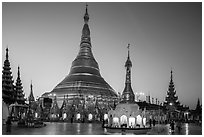 Shwedagon Pagoda gold covered stupa at dawn. Yangon, Myanmar ( black and white)