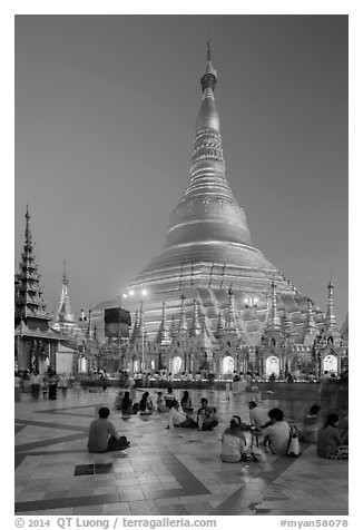 Praying from the Victory Ground, Shwedagon Pagoda, dusk. Yangon, Myanmar (black and white)