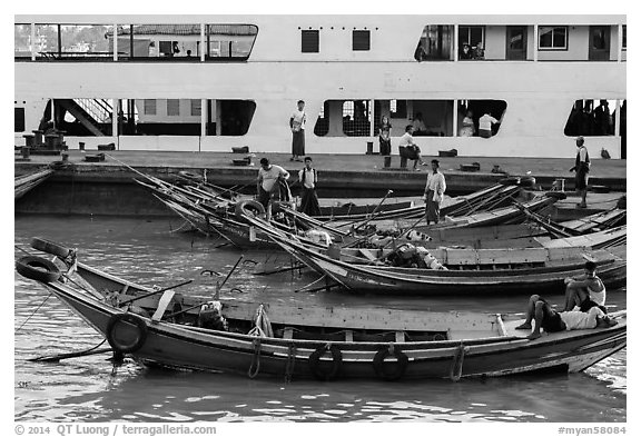 Long-tail boats and ferry, Sinodan pier. Yangon, Myanmar (black and white)