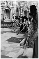 Women sweeping platform, Shwedagon Pagoda. Yangon, Myanmar ( black and white)