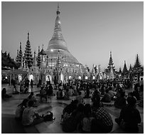 Praying from the Victory Ground, Shwedagon Pagoda, sunset. Yangon, Myanmar ( black and white)