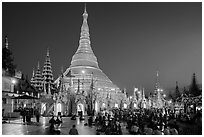 Praying from the Victory Ground, Shwedagon Pagoda, dusk. Yangon, Myanmar ( black and white)