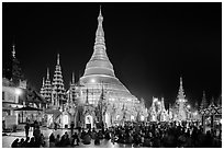 Praying from the Victory Ground, Shwedagon Pagoda, night. Yangon, Myanmar ( black and white)