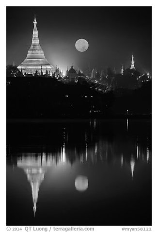 Full Moon setting over Shwedagon Pagoda and Kandawgyi Lake. Yangon, Myanmar (black and white)