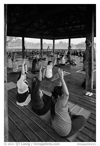 Women exercising in pavillion on Kandawgyi lake. Yangon, Myanmar (black and white)