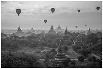Hot air ballons above temples at sunrise. Bagan, Myanmar ( black and white)