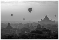 Aerial view of ancient temples and hot air ballons at sunrise. Bagan, Myanmar ( black and white)