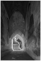 Corridor with frescoes and buddha statue, Sulamani temple. Bagan, Myanmar ( black and white)