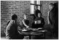 Buddhist novices preparing for lunch, Nyaung U. Bagan, Myanmar ( black and white)