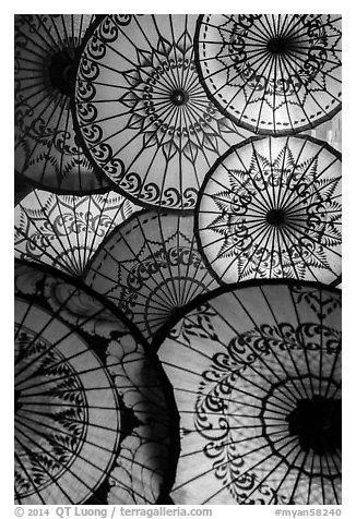 Backlit colorful sun umbrellas. Bagan, Myanmar (black and white)
