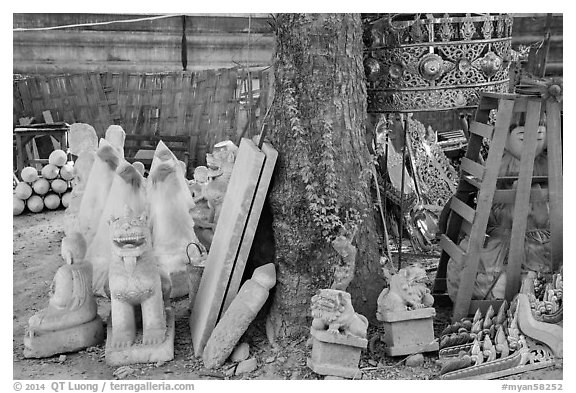 Assortment of sculptures, Marble street. Mandalay, Myanmar (black and white)