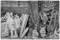 Assortment of sculptures, Marble street. Mandalay, Myanmar ( black and white)