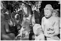 Buddha statues in various stages of completion on Marble street. Mandalay, Myanmar ( black and white)