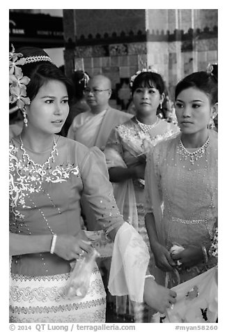 Women wearing their best dress for Shinbyu ceremony, Mahamuni Pagoda. Mandalay, Myanmar (black and white)