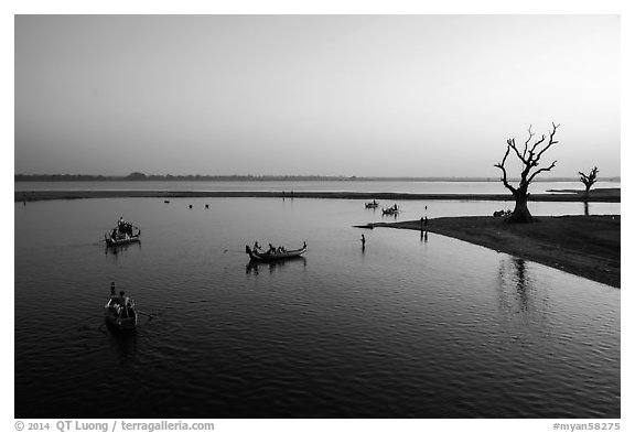 Tree skeletons and boats, Taungthaman Lake. Amarapura, Myanmar (black and white)