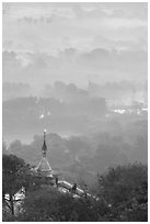 Stupa on Mandalay Hill overlooking misty plain. Mandalay, Myanmar ( black and white)
