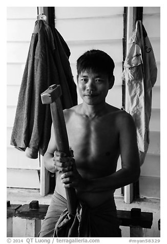 Gold pounder, gold leaf workshop. Mandalay, Myanmar (black and white)