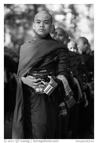 Monks stand in line before lunch, Mahagandayon Monastery. Amarapura, Myanmar (black and white)