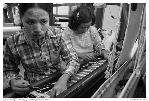 Women at work on loom. Amarapura, Myanmar (black and white)