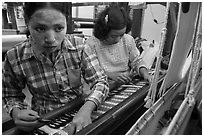 Women at work on loom. Amarapura, Myanmar ( black and white)