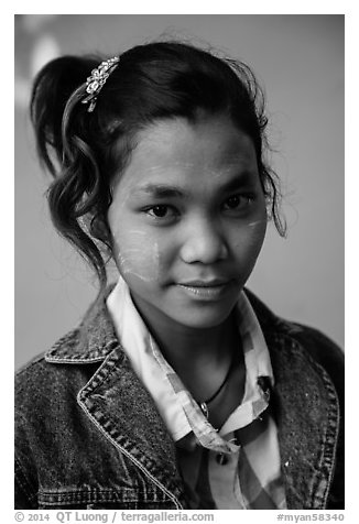 Woman with blue jeans jacket and thanaka paste. Mandalay, Myanmar (black and white)