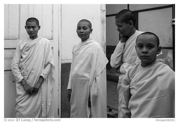 Nuns and pastel walls, Zayar Theingi Nunnery, Sagaing. Myanmar (black and white)