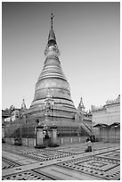 Man praying at main stupa of Soon U Ponya Shin Pagoda. Myanmar ( black and white)