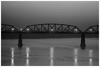 Ava Bridge over Ayeyarwady river at dusk, Sagaing. Myanmar ( black and white)