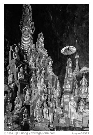 Many buddha images surround main stupa in Pindaya Caves. Pindaya, Myanmar (black and white)