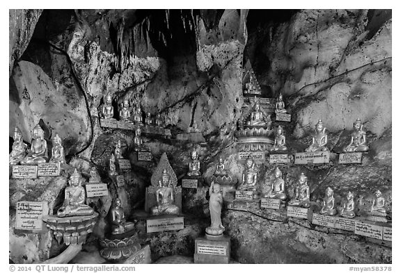 Some of 8,000 buddha images in Pindaya Caves. Pindaya, Myanmar (black and white)