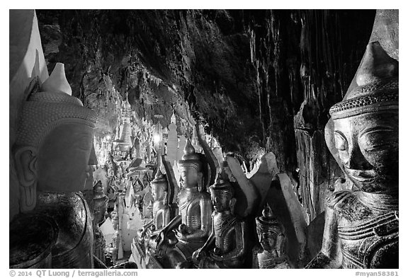 Buddha statues and stalactites in Pindaya Caves. Pindaya, Myanmar (black and white)