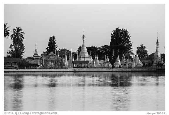 Pagoda reflected in Pone Tanoke Lake at dawn. Pindaya, Myanmar (black and white)