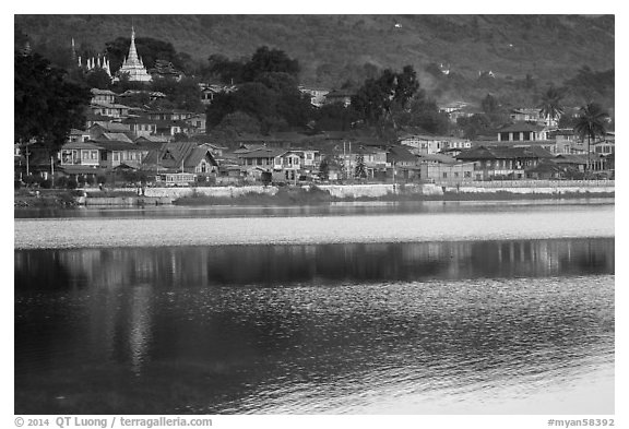Town and ripples on Pone Tanoke Lake. Pindaya, Myanmar (black and white)