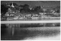 Town and ripples on Pone Tanoke Lake. Pindaya, Myanmar ( black and white)