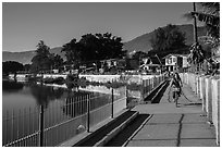 Woman biking near Pone Tanoke Lake. Pindaya, Myanmar ( black and white)