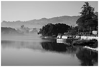 Pone Tanoke Lake with early morning mist. Pindaya, Myanmar ( black and white)