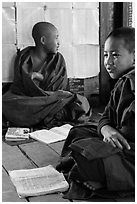 Novices studying, Shweyanpyay Monastery, Nyaung Shwe. Inle Lake, Myanmar ( black and white)