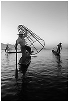 Group of Intha fishermen at dawn. Inle Lake, Myanmar ( black and white)