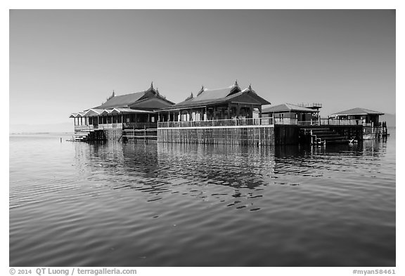 Restaurant built on stilts in middle of lake. Inle Lake, Myanmar (black and white)